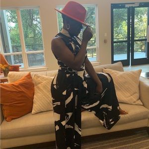 Black white and hint of orange jumpsuit